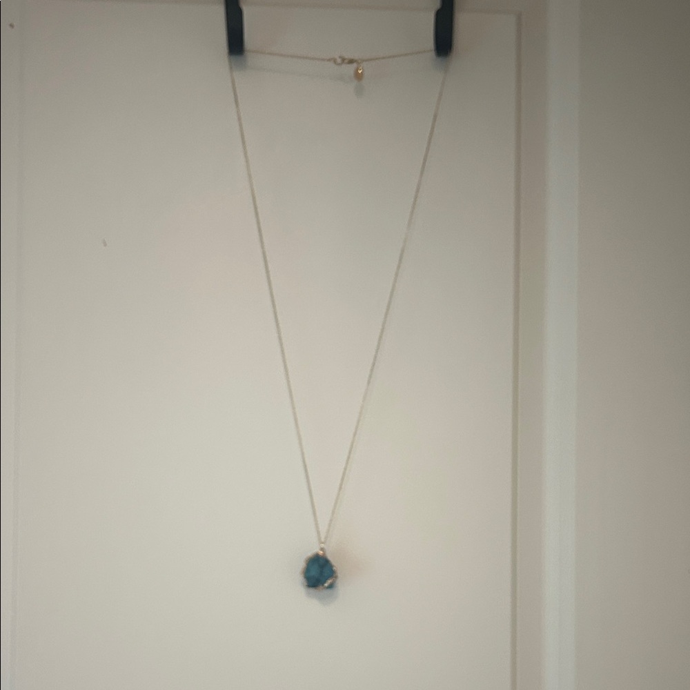 Charming Charlie Silver Necklace with Blue Pendant
